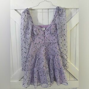 light purple mini dress with sheer sleeves and embroidered detailing
